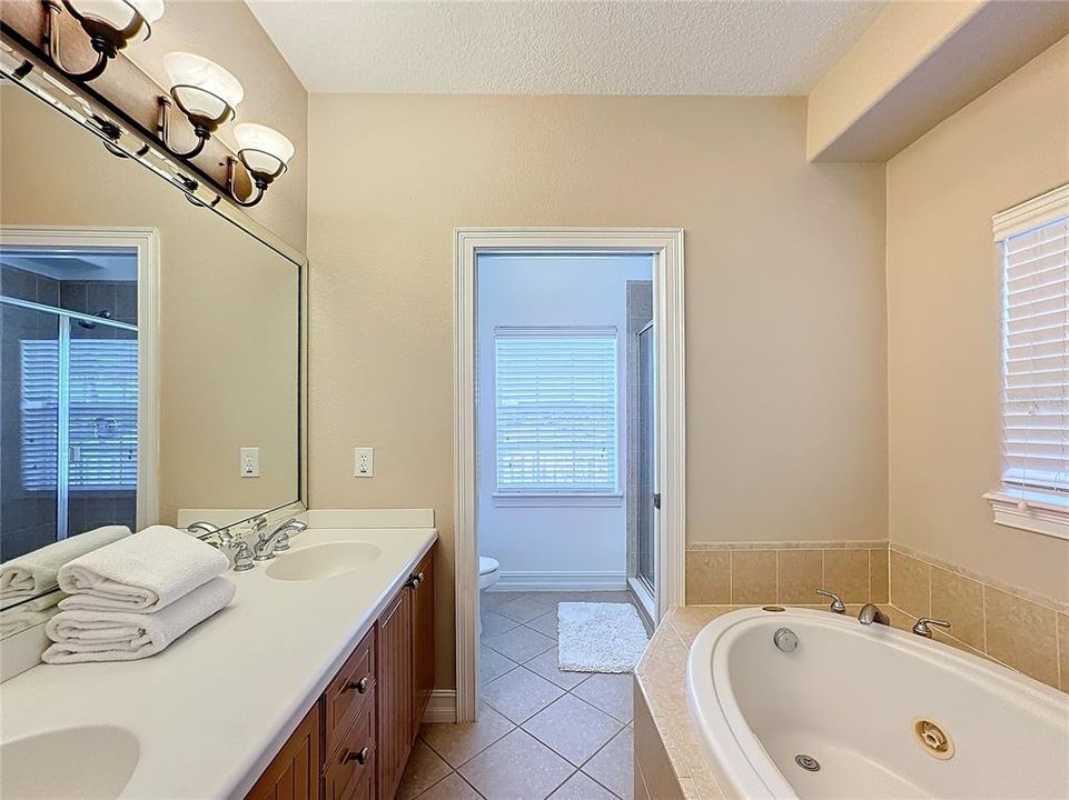 Another ensuite bathroom providing a luxurious and private retreat, designed to offer both functionality and relaxation.