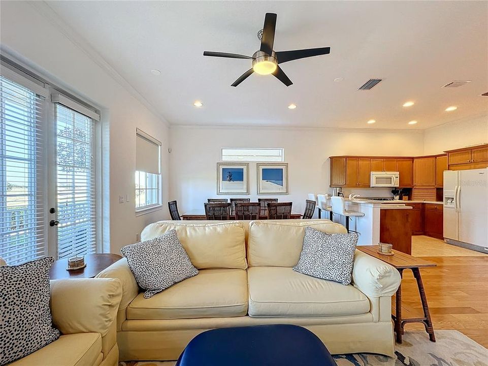 The living room is an inviting extension of the dining area.