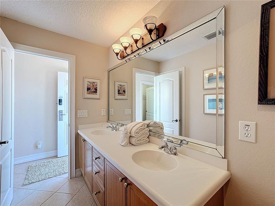 Another view of the guest bathroom located upstairs above the garage.