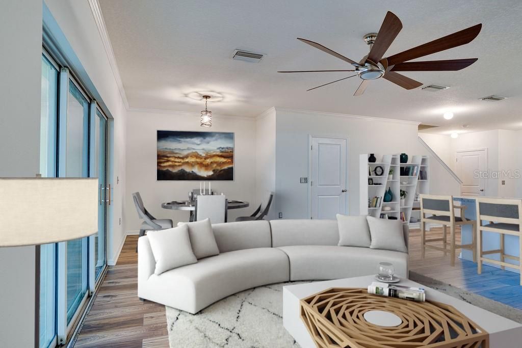 Staged living room dining room combo.