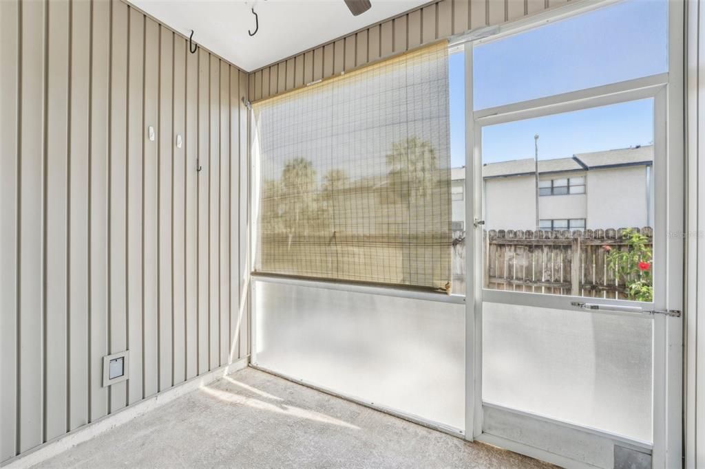 Screened rear porch.