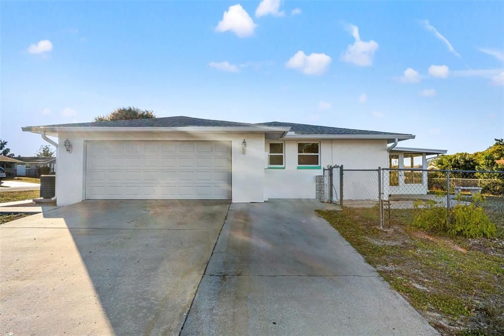 side entry garage, extra wide driveway for parking