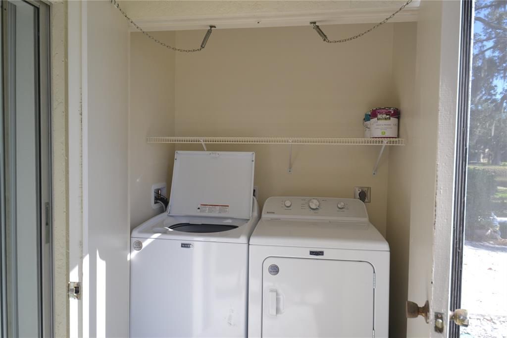 New washer and dryer on the back lanai. Keeping the dryer heat out and the noise of machines to a minimum