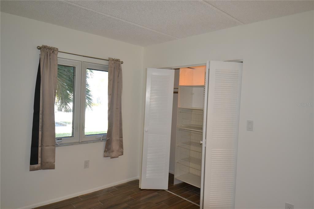 Large wall closet with extra shelving