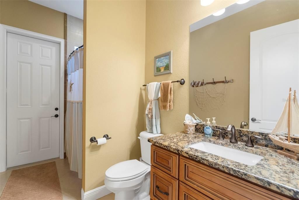 Guest bath with direct pool area access