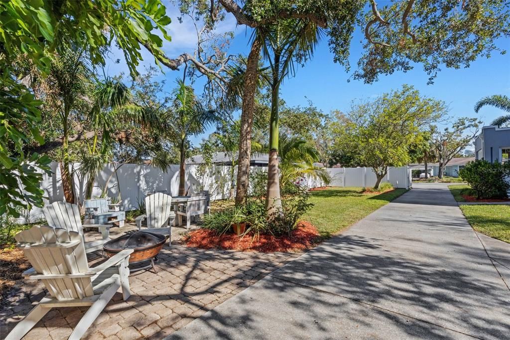 Lovely pavered patio area beneath the shade trees