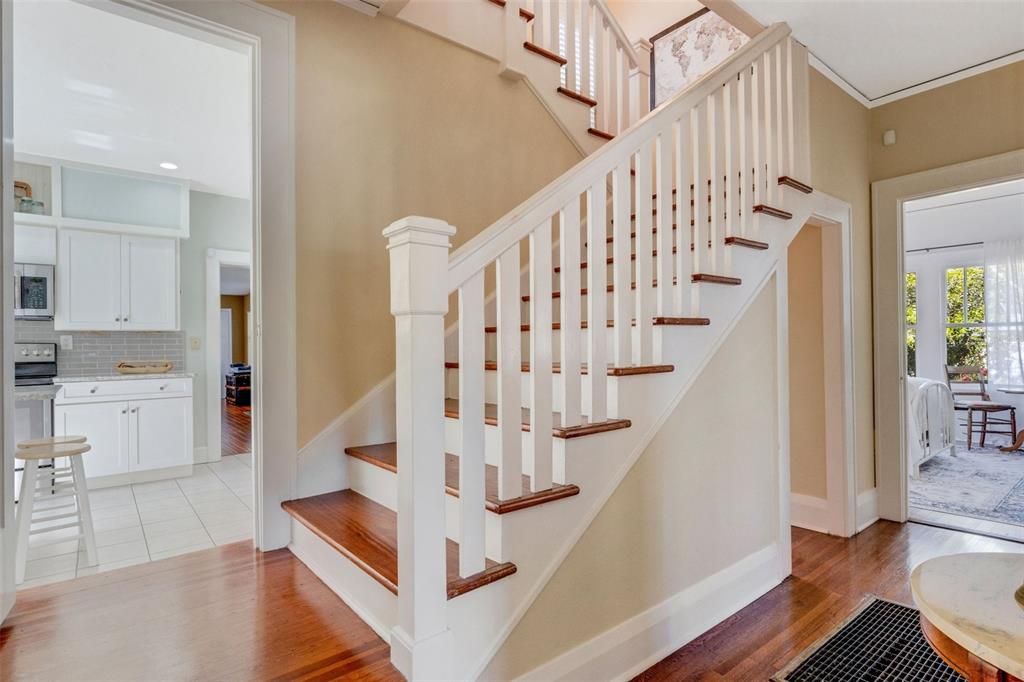 A classic old floor grate (like in your grandmother's house) and an alcove leading to the guest bath