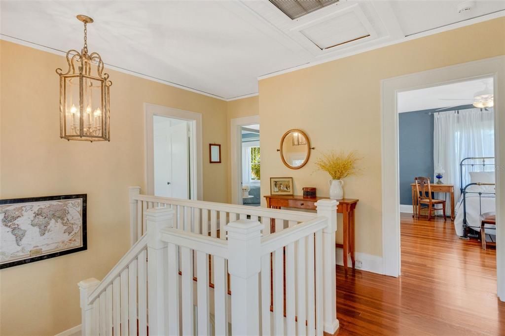 These rich pine floors are simply breathtaking. The whole house attic fan has been replaced by modern air conditioning, as you can see. Thank goodness; after all, this is Florida!