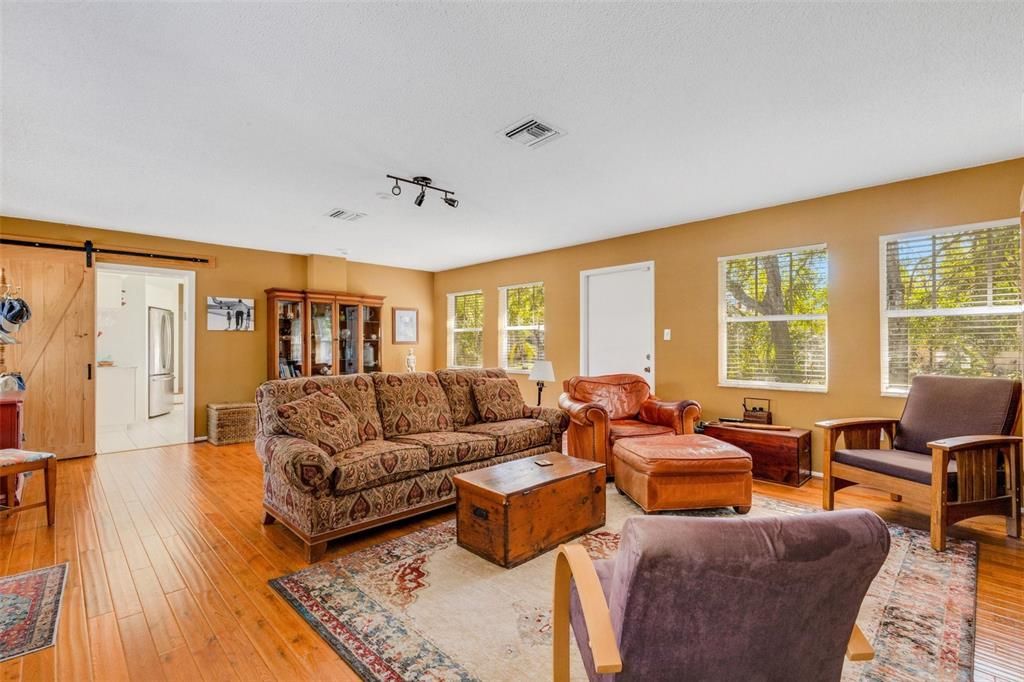 Huge family room off the kitchen is large enough to accommodate all your activities; pool table, exercise  equipment, you name it!