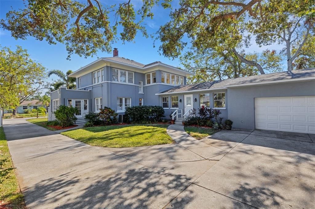 The driveway is gated and has plenty of parking space