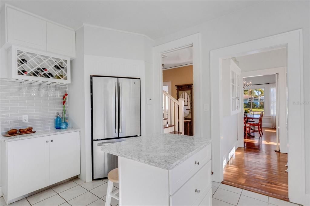 A built-in wine rack holds a few of life's pleasures with additional storage above