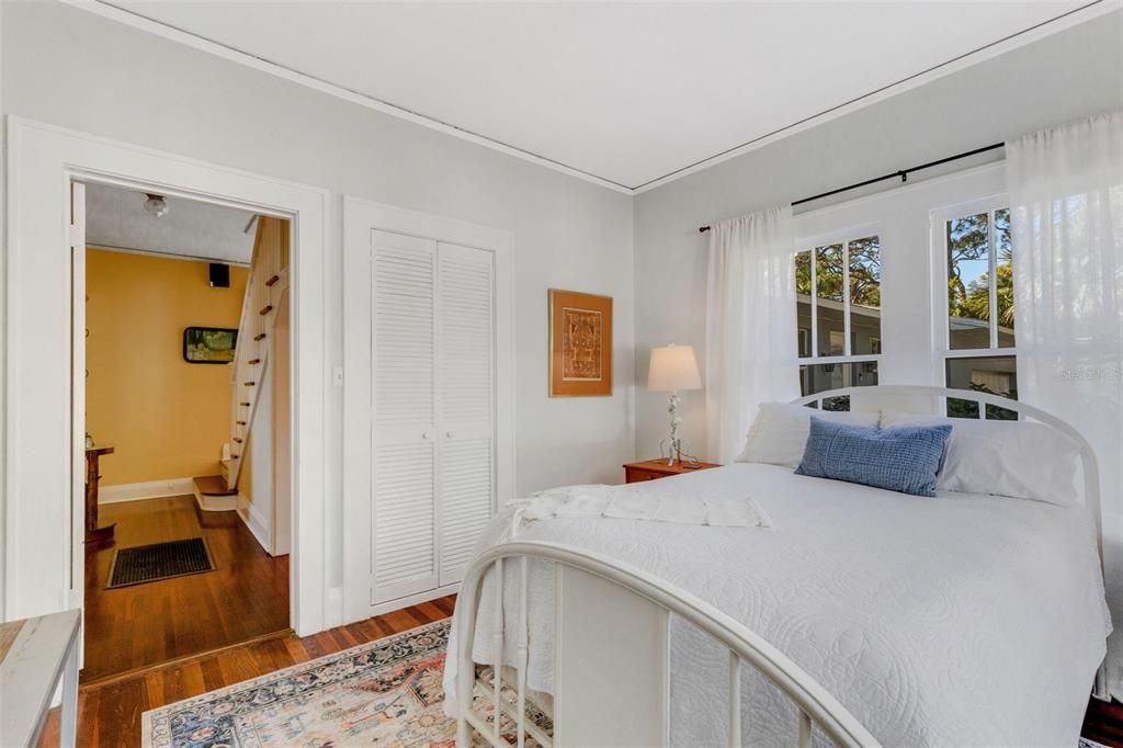 Quiet first floor bedroom offers privacy while remaining close to the action