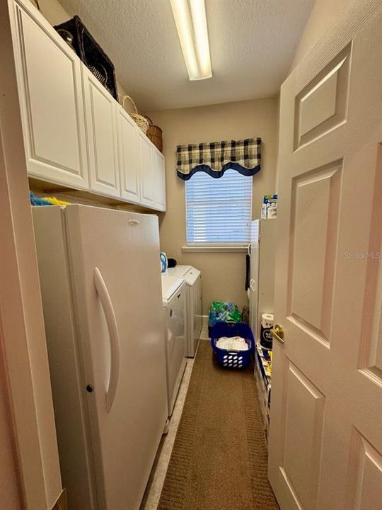 laundry room off of the garage entrance