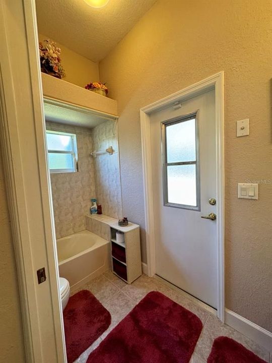 Single bathroom for guest room and direct access from pool