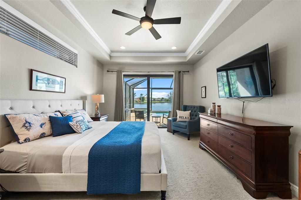 Primary bedroom overlooking the pool