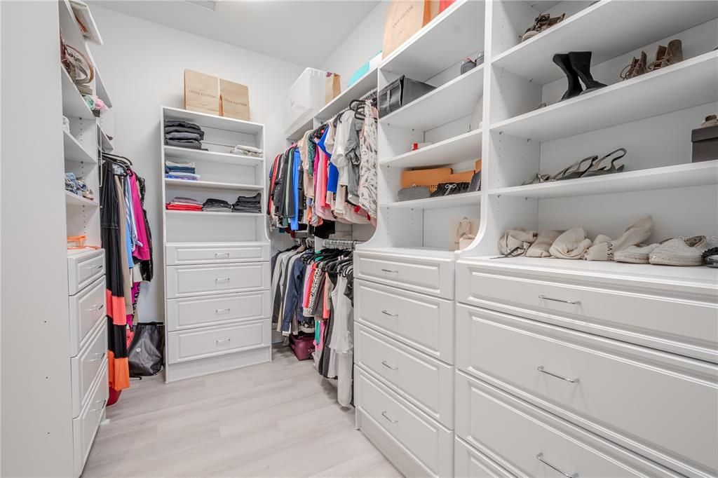 Primary walk-in closet.