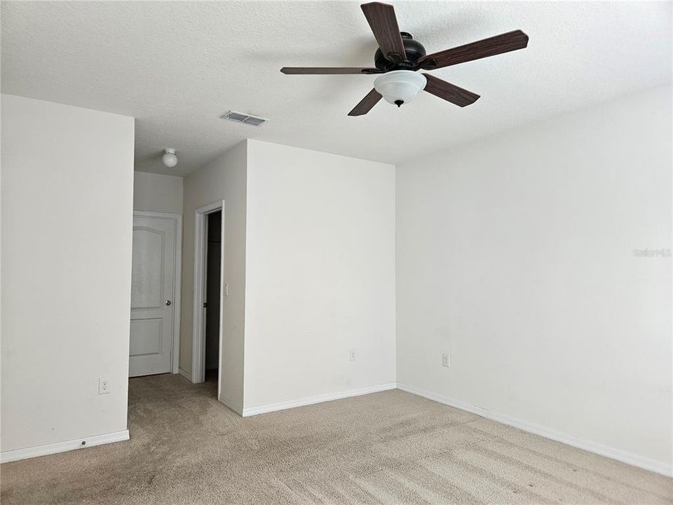 Master bedroom short hallway to bathroom