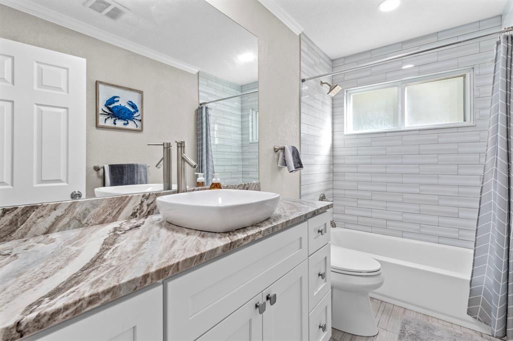 Bathroom in between guest bedrooms