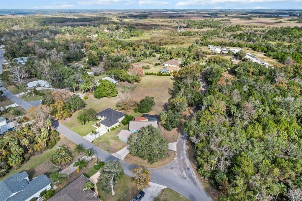 Aerial view showing the corner lot bordering on West Waterway and South Lynwood