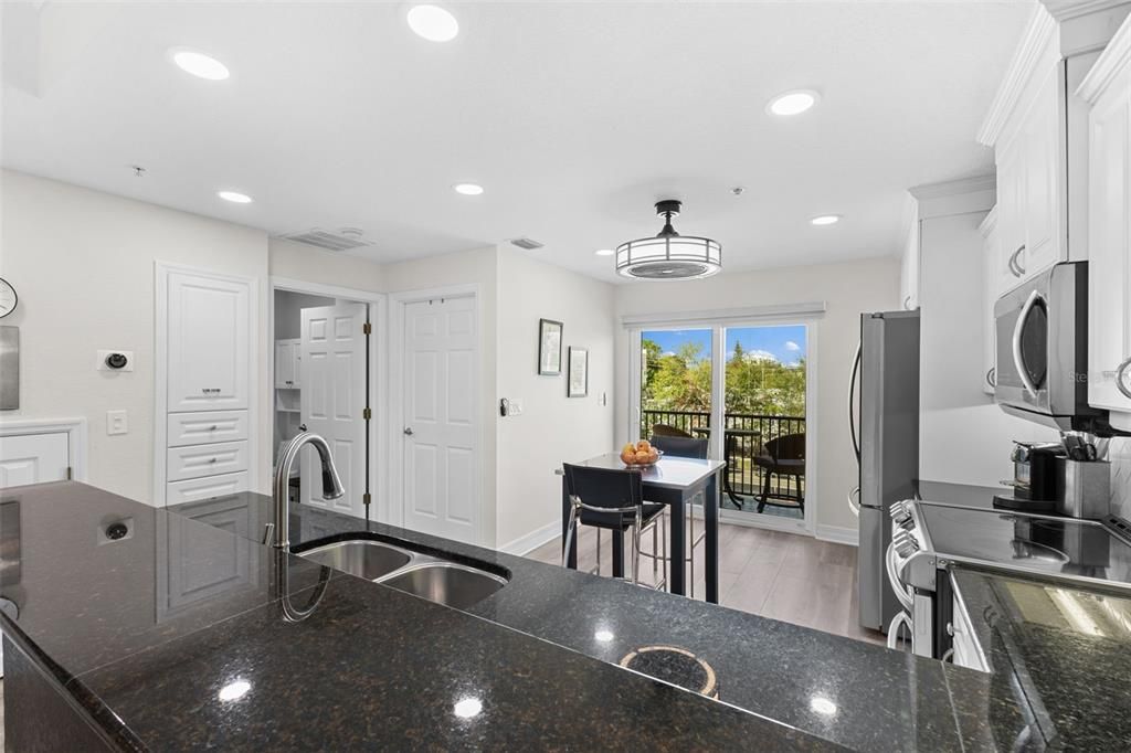 Left door is the half bath entry and the right door is the laundry room