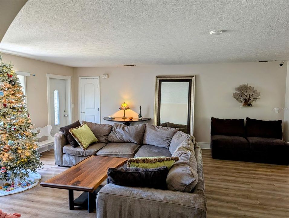 Looking back to the front door. Check out the luxury vinyl tile flooring for durability and easy cleaning!