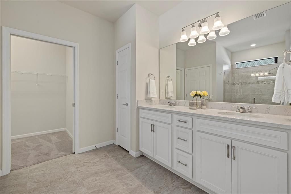 Primary Bathroom with tile floors