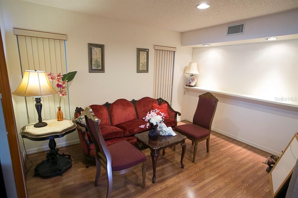 Dining area that is currently used as a sitting room