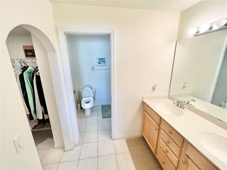 Primary bath with walk-in closet