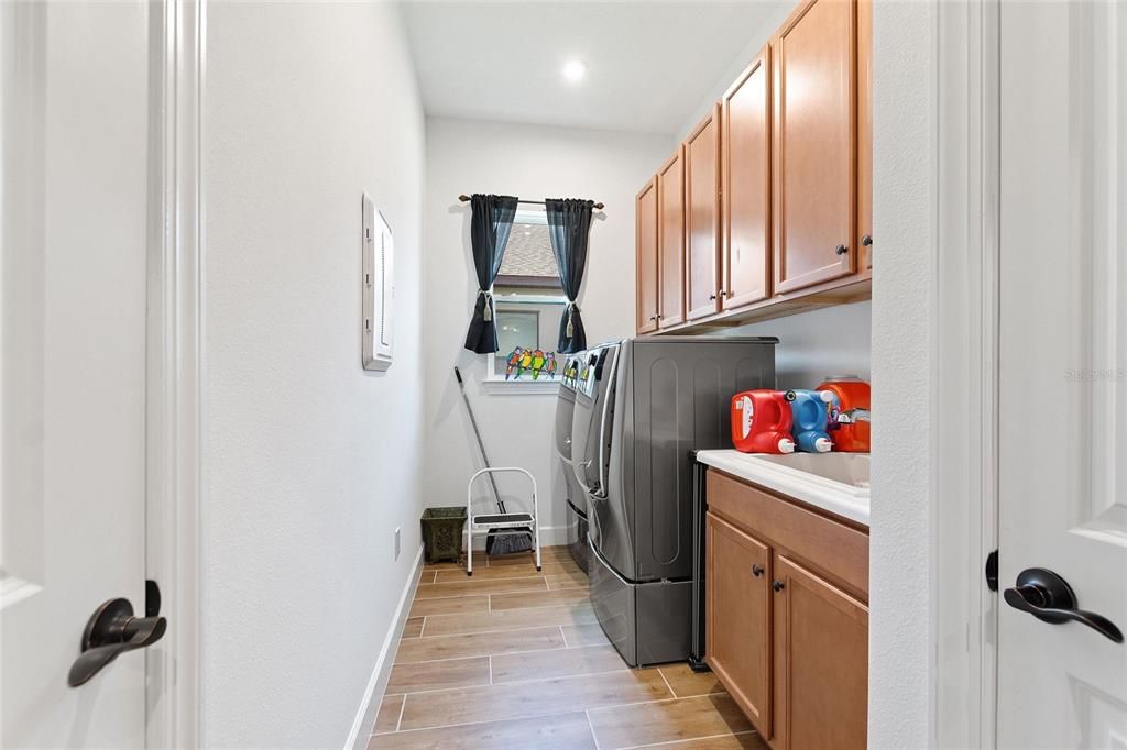 Laundry Room with Sink & Cabinets