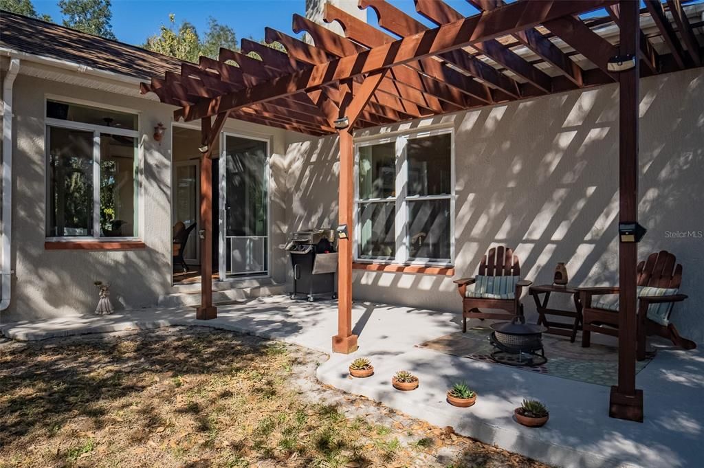 Pergola over patio Includes grill and outside patio furniture