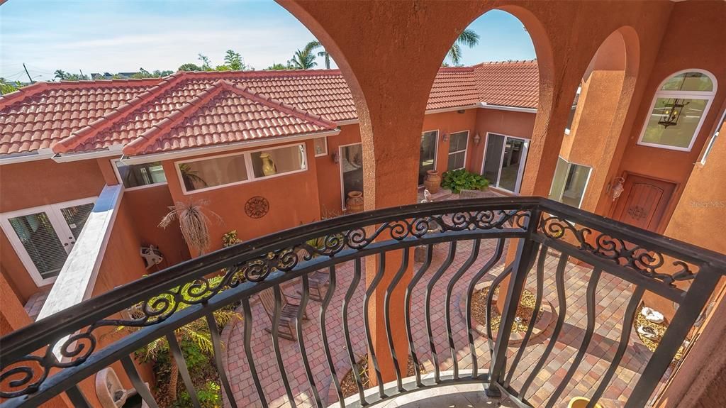 Courtyard view from 2nd story Balcony in Family/Game Room