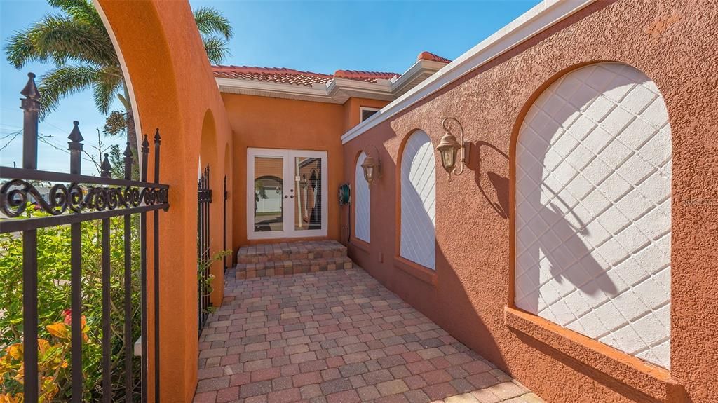 Separate Entrance to Home Office at the front of the home thru French Doors.