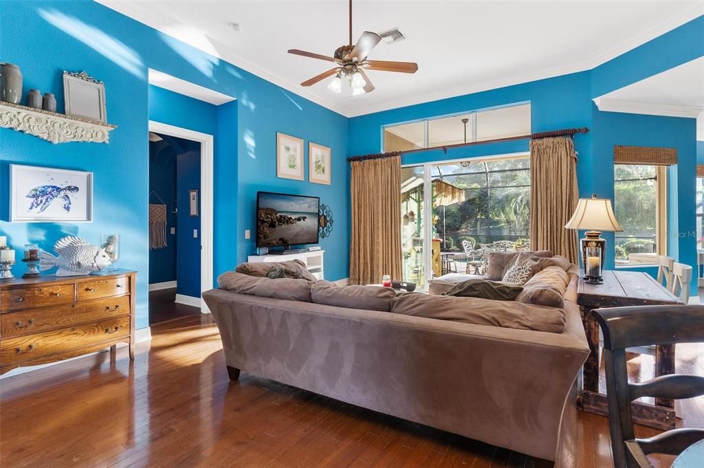 Living Area with Sliding Glass Doors leading to Lanai and Pool Area