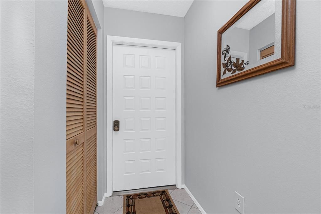 The raised panel front door adds character to the home!