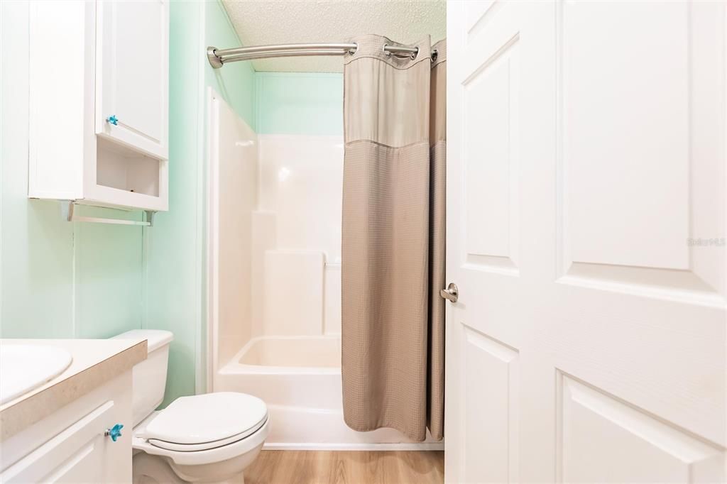 Guest bathroom shower tub combo