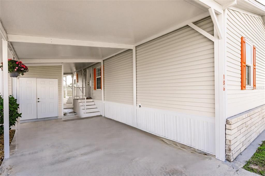 Insulated panel and reinforced carport beams