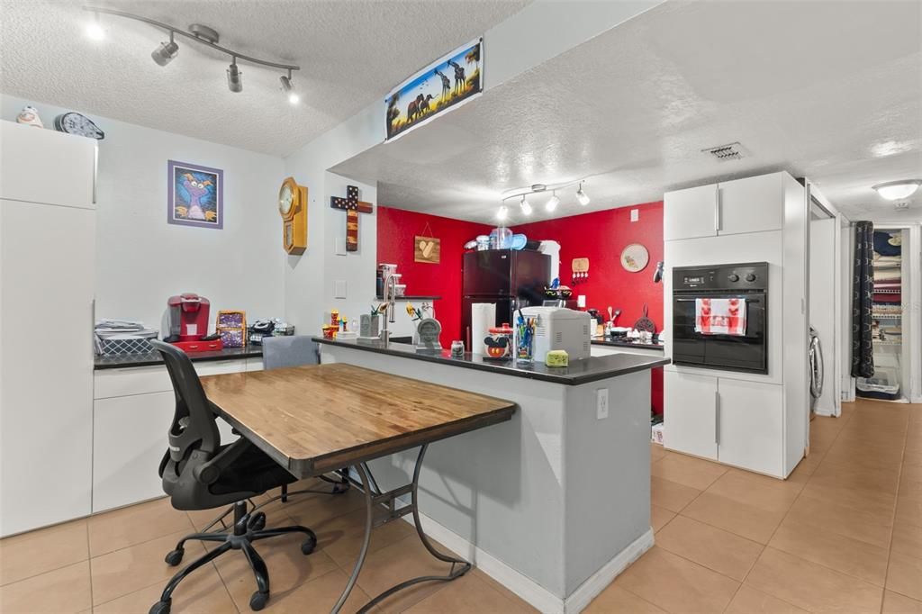 Dining space with additional cabinetry for storage