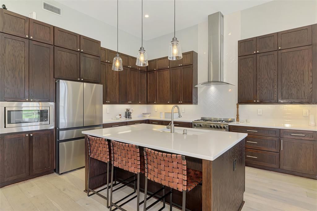 The chef in the family will enjoy the gas cooktop, quartz countertops and plentiful storage.