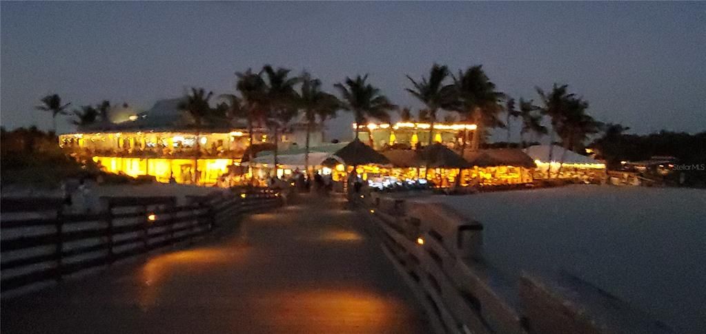 Everything is beautiful at night. This is Sharky's and Fins at night from the pier