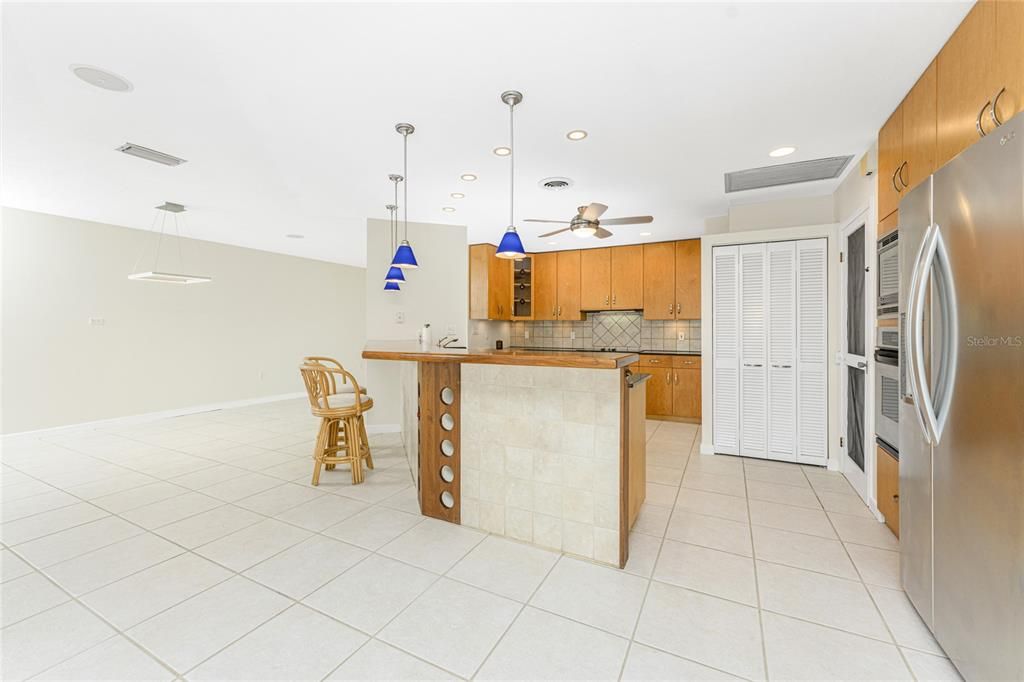 Kitchen opens to Dining & LIving Space. Pantry closet.