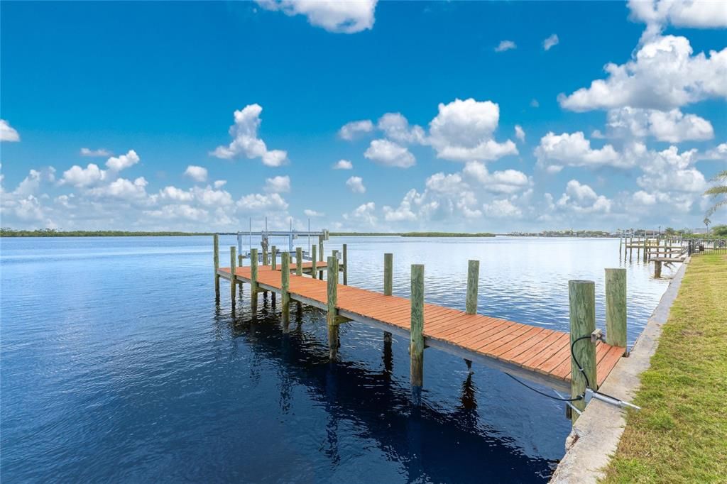 Pool has long expansive view across the switch channel in the river