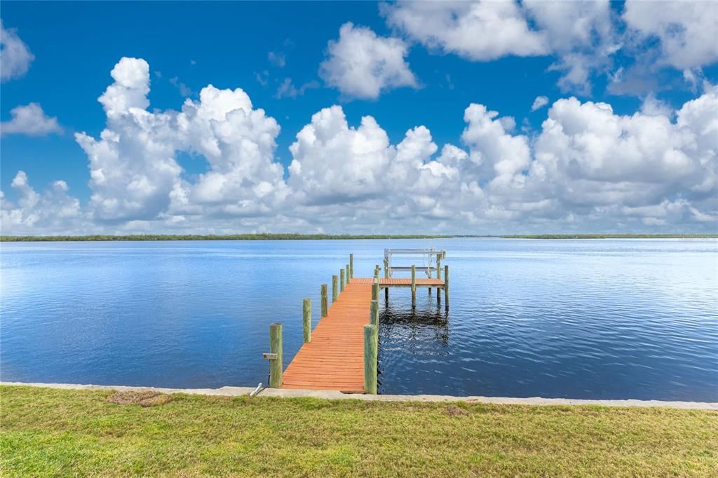 Private dock & lift features electric & water. Embark on your waterfront adventures from your own backyard.