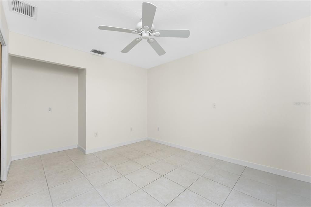 Bedroom 3 had been used as home office with file cabinet alcove