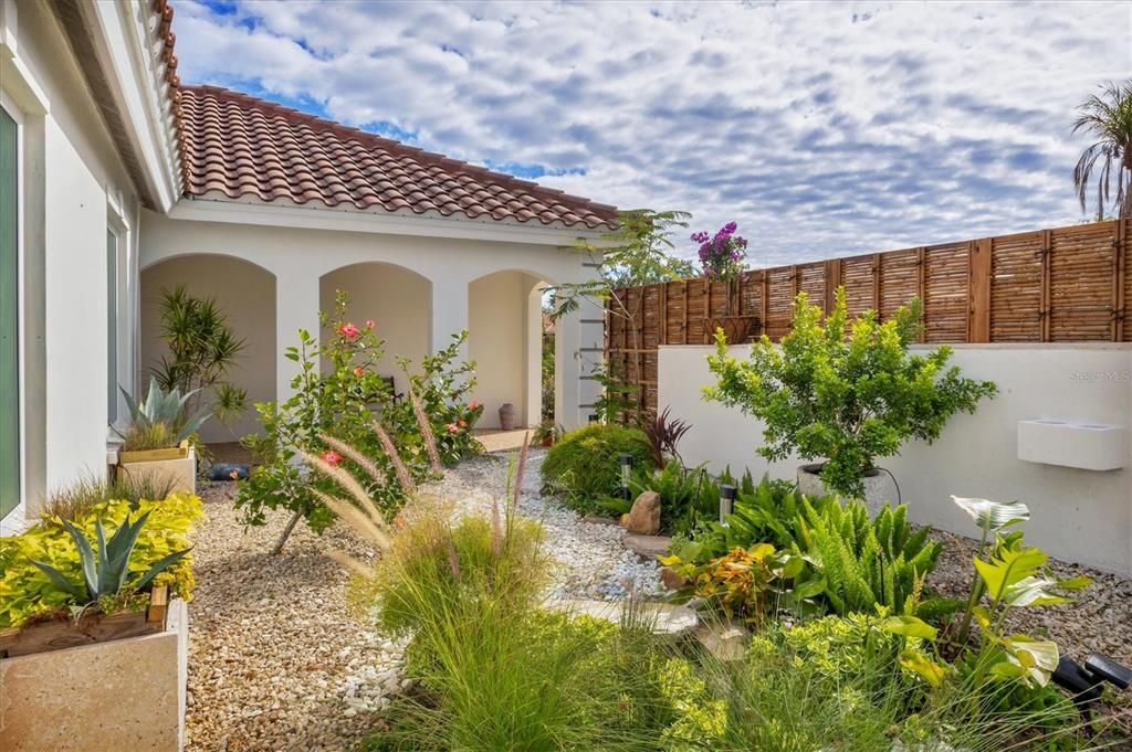 The Living  Flow begins at the Bamboo Privacy Fence and moves through the Eastern Garden.