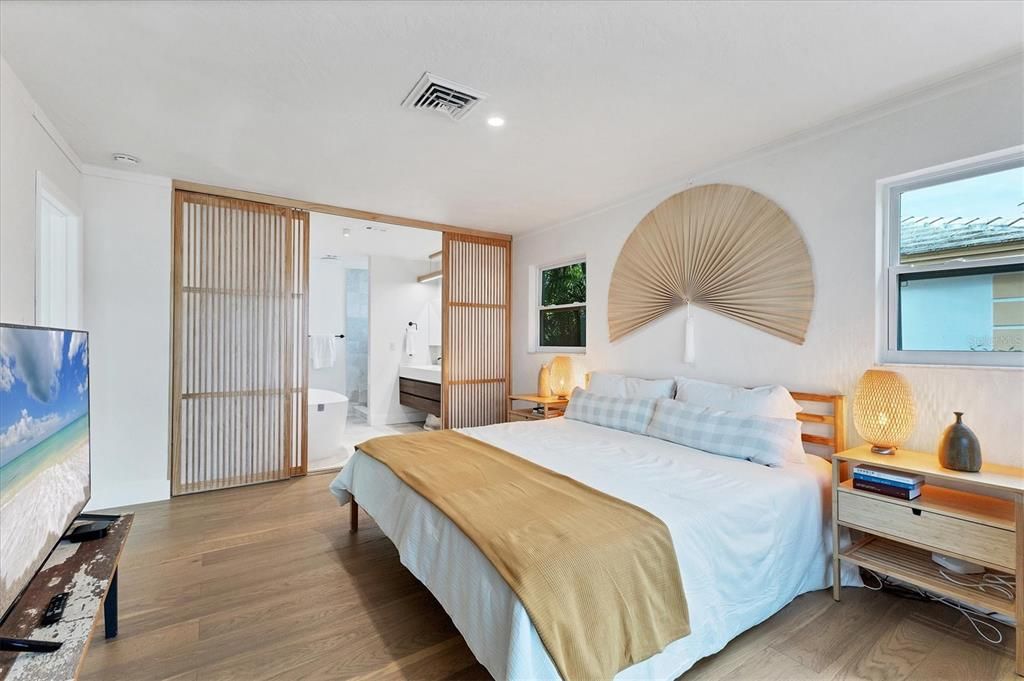 Master Bedroom and entrance to the Master Bathroom with Pinewood Doors and Shoji Paper