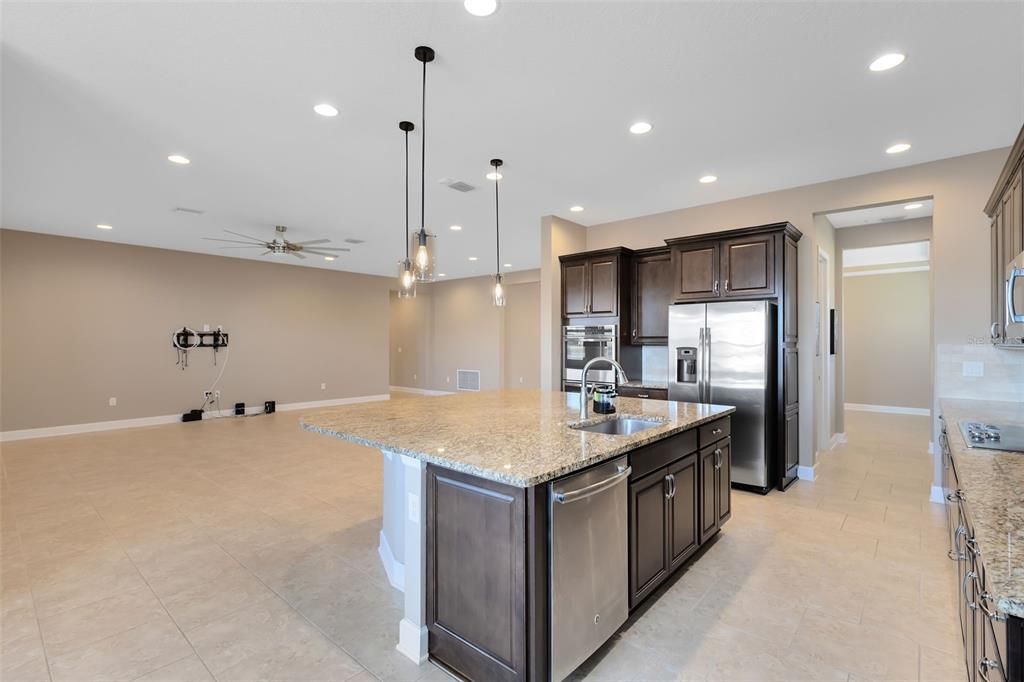 This photo has been virtually staged. The primary bedroom features a stylish tray ceiling.