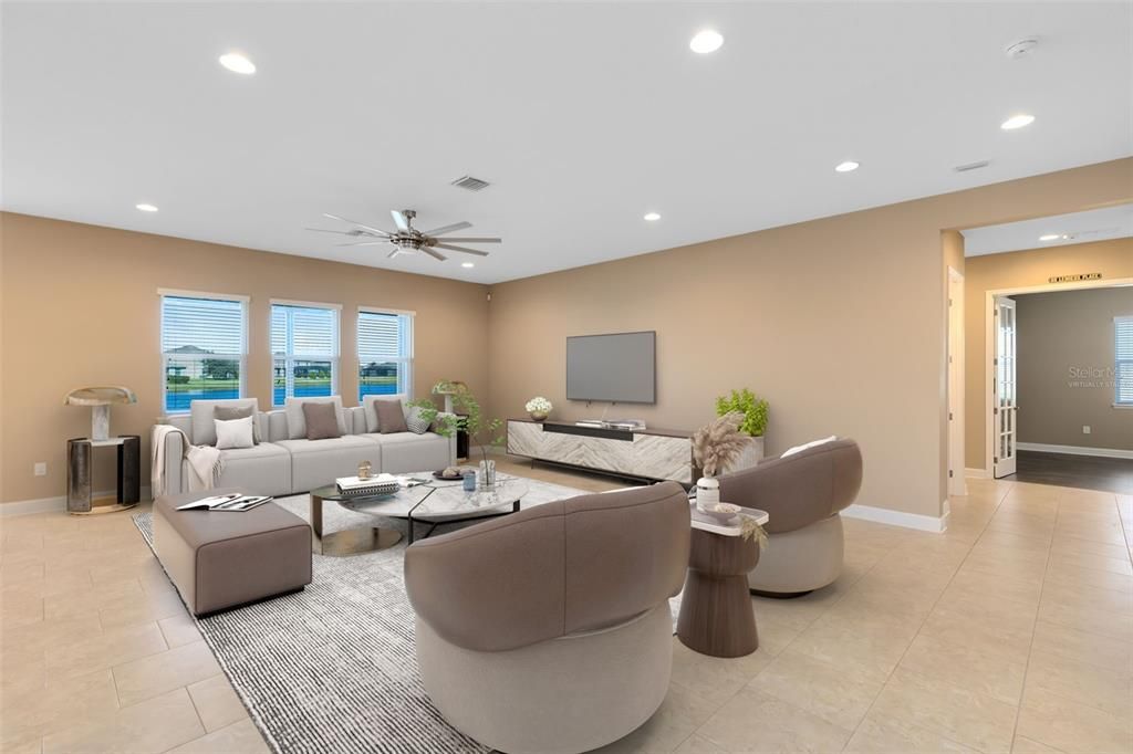 A view from the kitchen into the breakfast nook and great room.