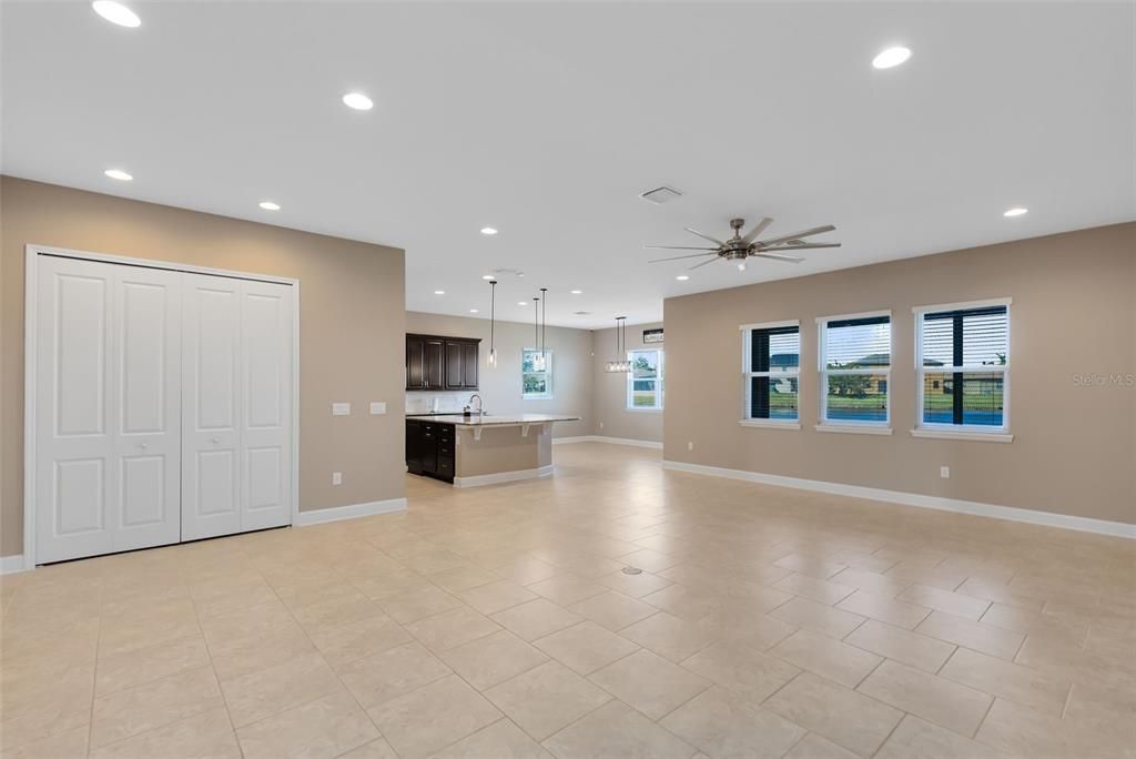 This photo has been virtually staged. High ceilings and natural light abound.