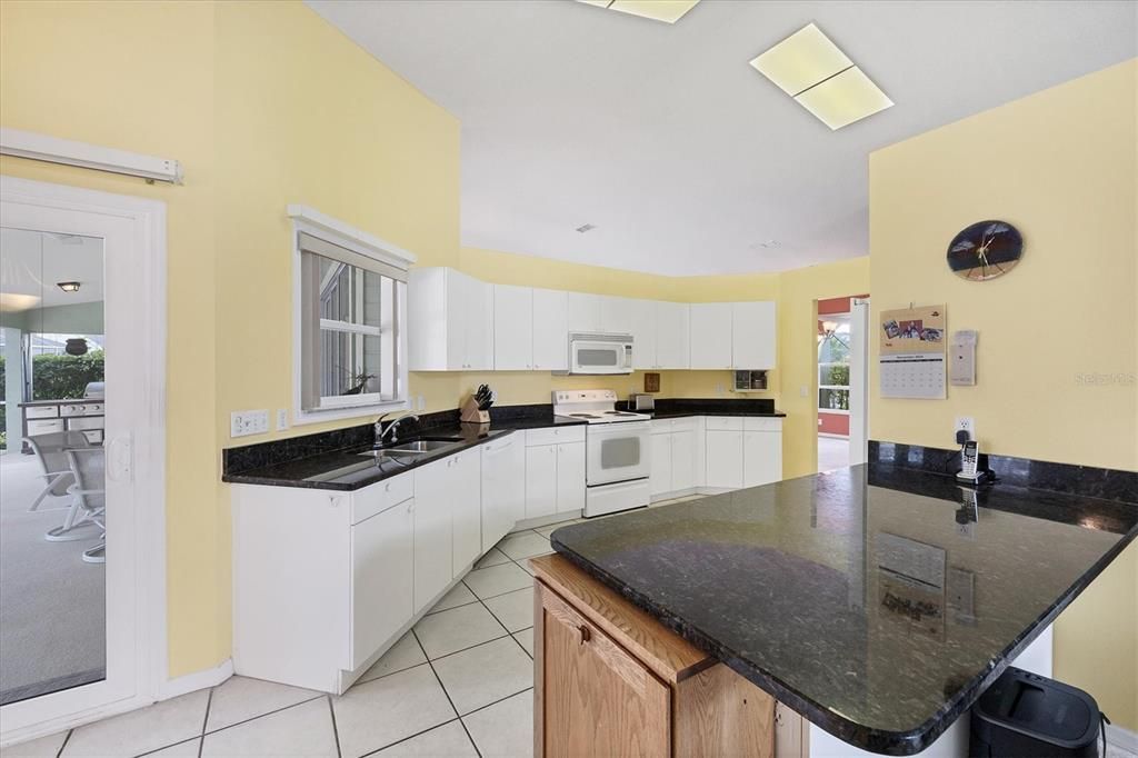 Bright kitchen with granite counters