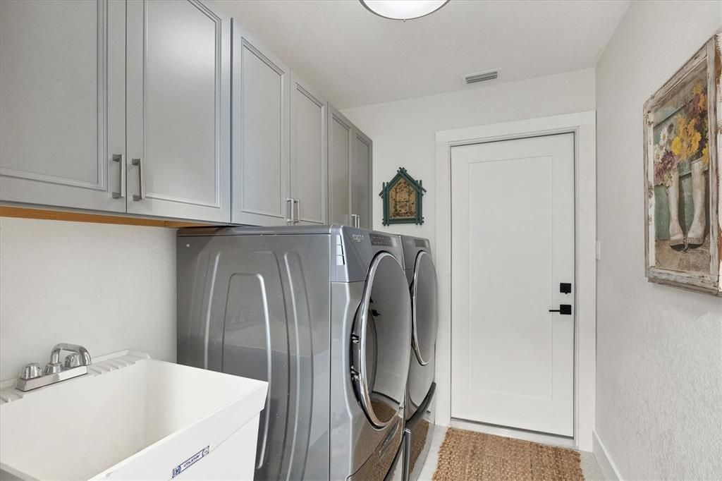 Laundry room with lots of storage.